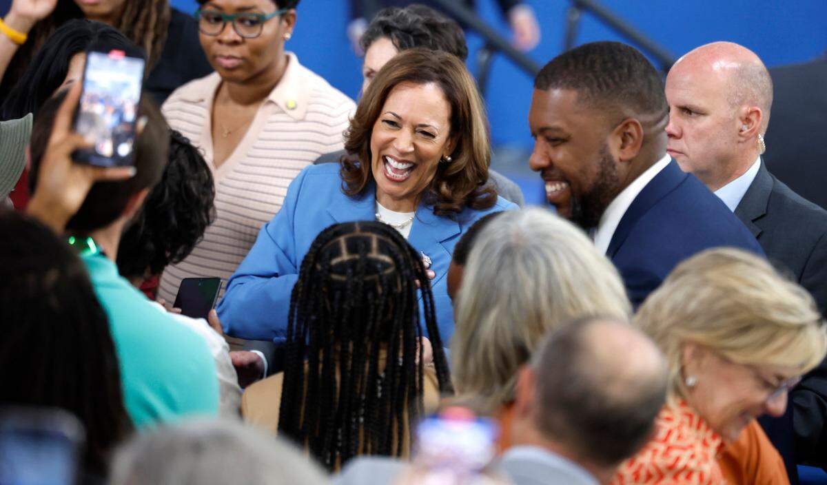 Vice President and Democratic nominee for president Kamala Harris greets supporters after speaking at Wake Tech Community College’s North Campus in Raleigh, N.C., Friday, August 16, 2024. Durham Mayor Leonardo Williams is to the right.