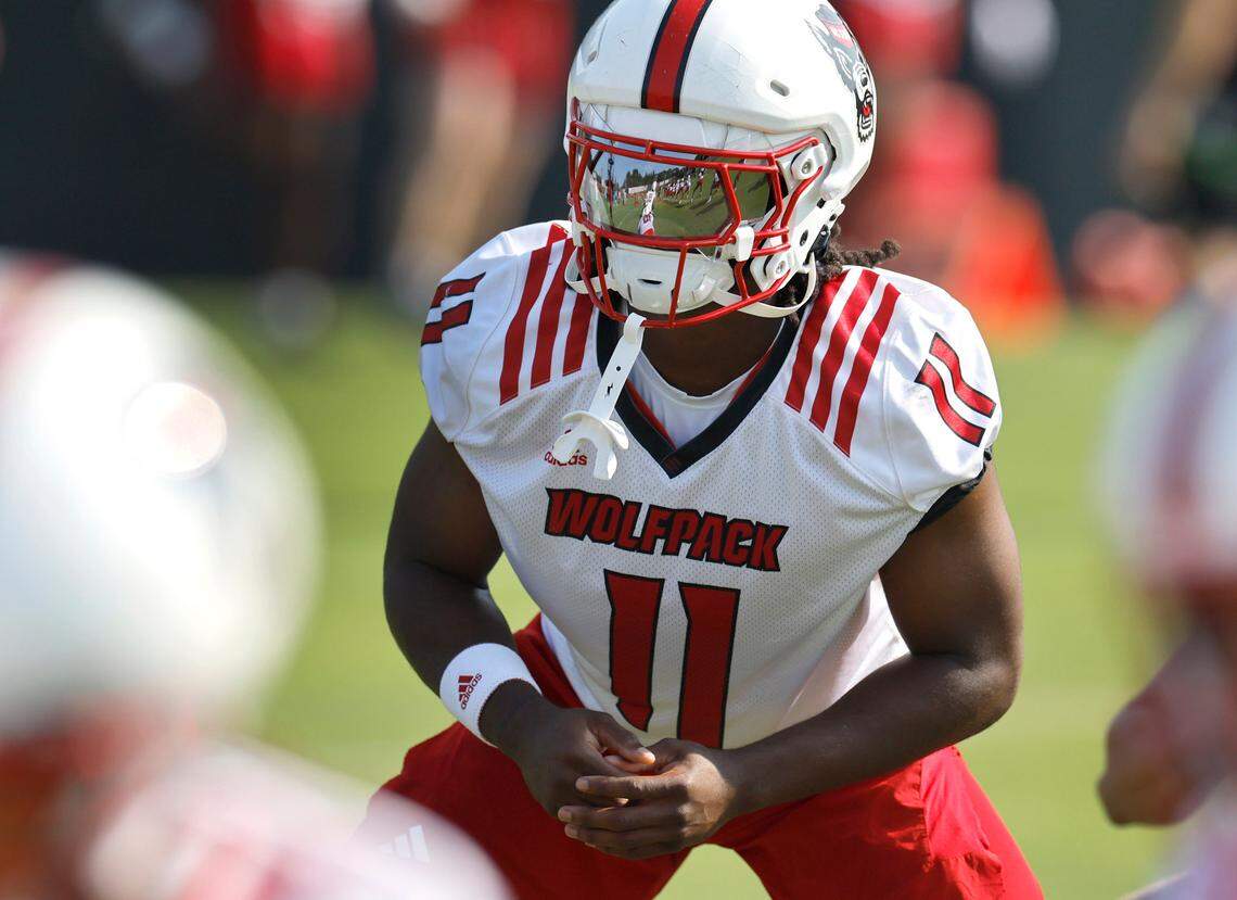 N.C. State safety Ja’Had Carter (11) warms up during the Wolfpack’s first practice in Raleigh, N.C., Wednesday, July 31, 2024.