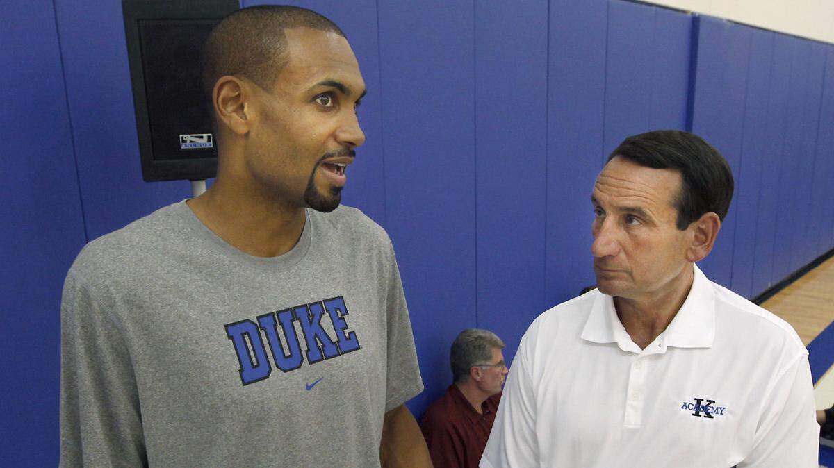 Duke University head basketball coach Mike Krzyzewski (right) speaks with former player Grant Hill , Class of 1994 Wednesday June 1, 2011 at the opening of his K Academy 9 Fantasy basketball camp.camp.