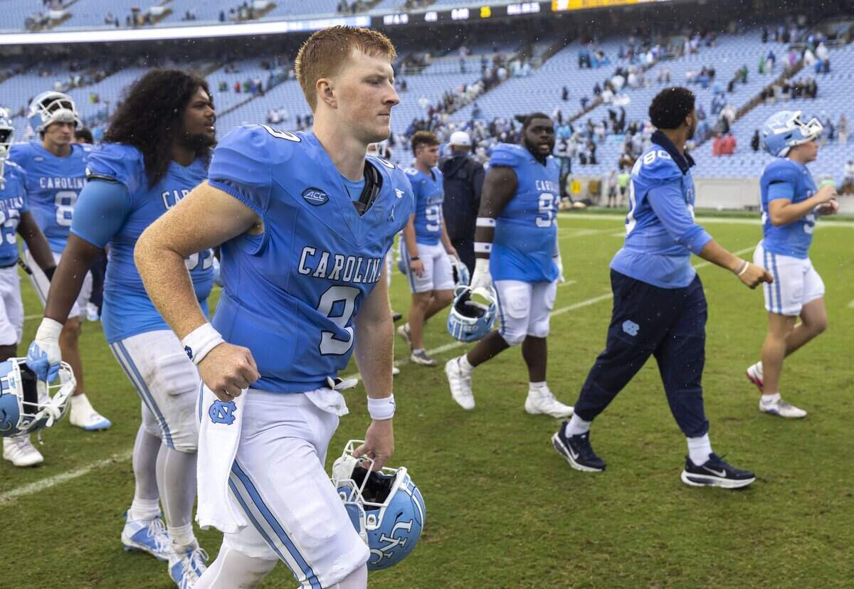 North Carolina quarterback Billy Edwards Jr. (9) leaves the field with his teammates following the Tar Heels’ 37-26 loss on Saturday, Oct. 3, 2026, at Kenan Memorial Stadium in Chapel Hill, N.C.