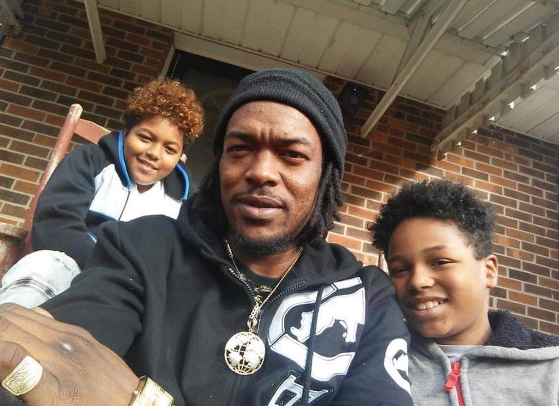 Kenneth pictured with his oldest sons, Kenneth III and Saveon.