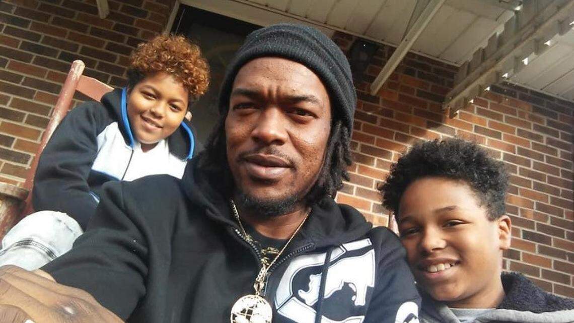 Kenneth pictured with his oldest sons, Kenneth III and Saveon.