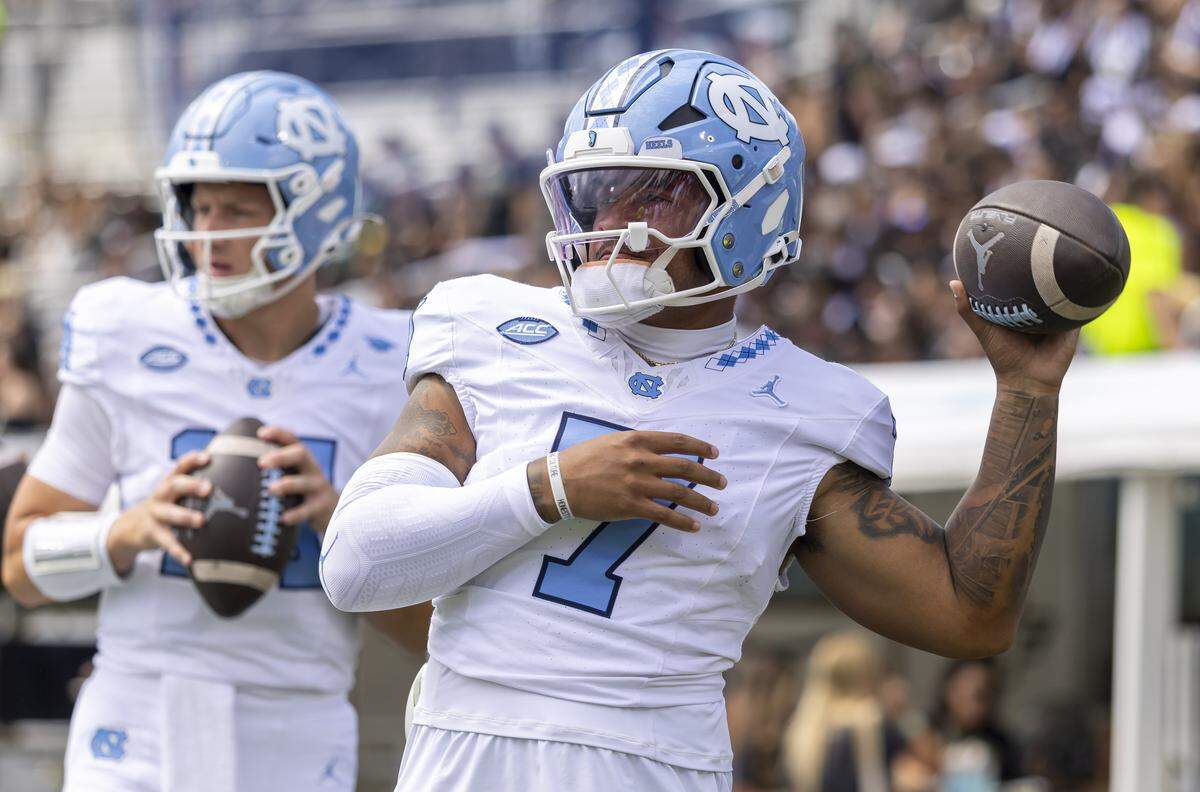 North Carolina quarterback Gio Lopez (7) warms up for the Tar Heels’ game against the University of Central Florida on Saturday, September 20, 2025 in Orlando, Fla.