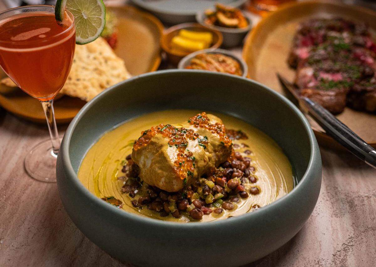 On the opening menu at Peregrine, an ambitious new Raleigh restaurant, you’ll find a roasted halibut bathed in buffalo butter and lamb bacon.