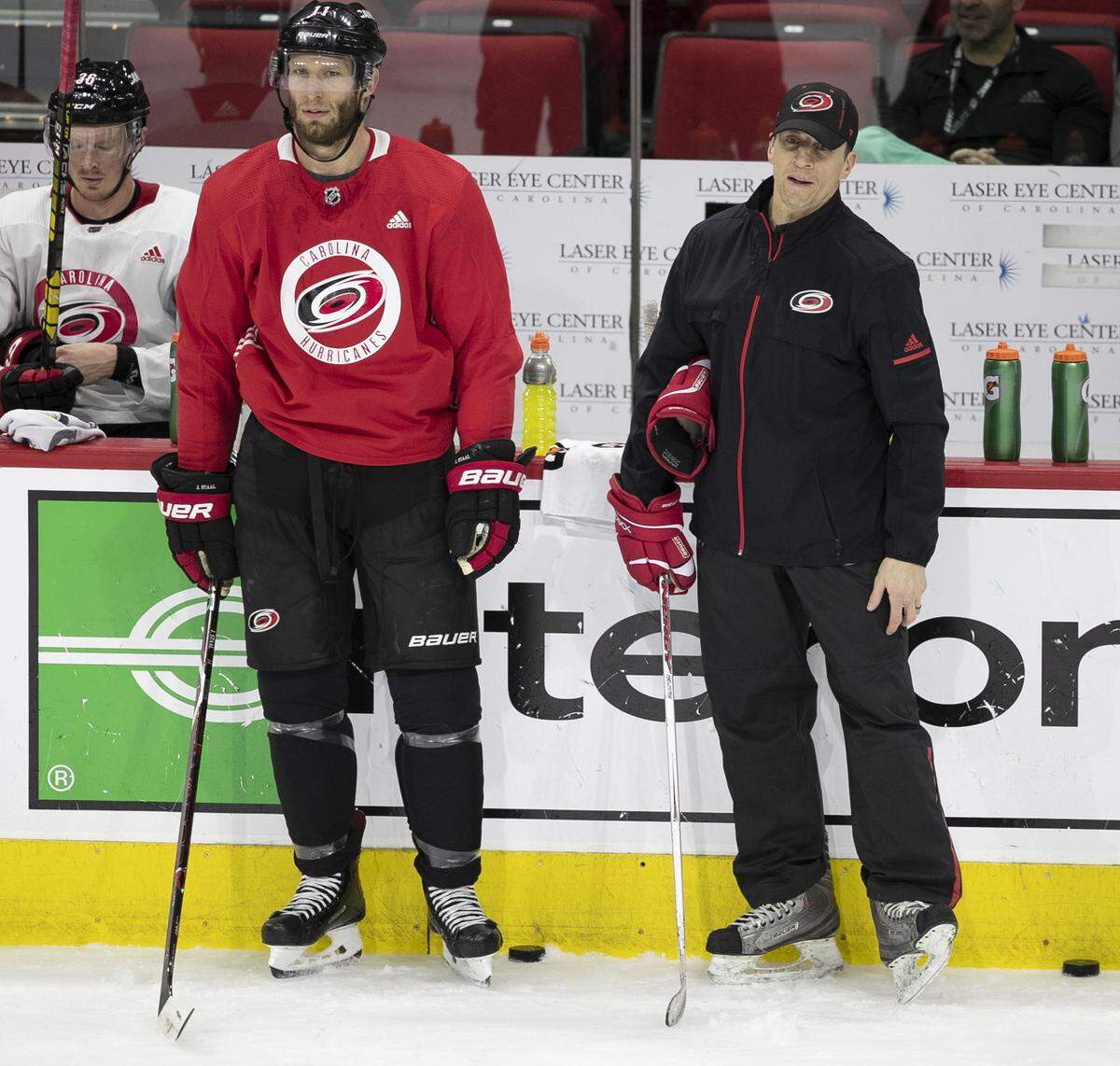 Carolina Hurricanes’ Jordan Staal (11) and coach Rod Brind’Amour watch practice on Tuesday, April 30, 2019 at the PNC Arena in Raleigh, N.C. 