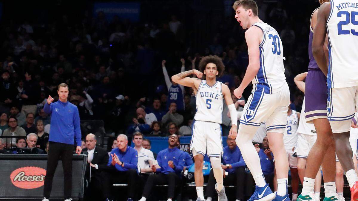 Duke’s Kyle Filipowski (30) celebrates after making the basket while being fouled during Duke’s 93-55 victory over James Madison in the second round of the NCAA Tournament at the Barclays Center in Brooklyn, N.Y., Sunday, March 24, 2024.