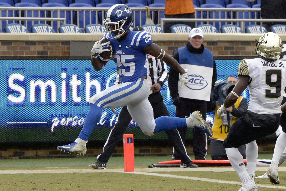 Duke running back Deon Jackson (25) heads into the end zone during a game against Wake Forest at Wallace Wade Stadium, Saturday, Nov. 24, 2018 in Durham, N.C.