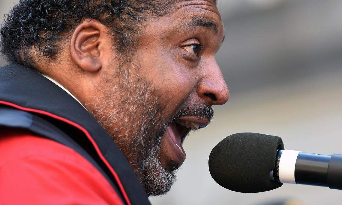 Rev. William Barber makes a speech at the Bicentennial Mall as members of the Moral Monday rally across the street from the legislative building Monday, May 16, 2016. Hundreds of protesters convened on the General Assembly to protest controversial HB2.