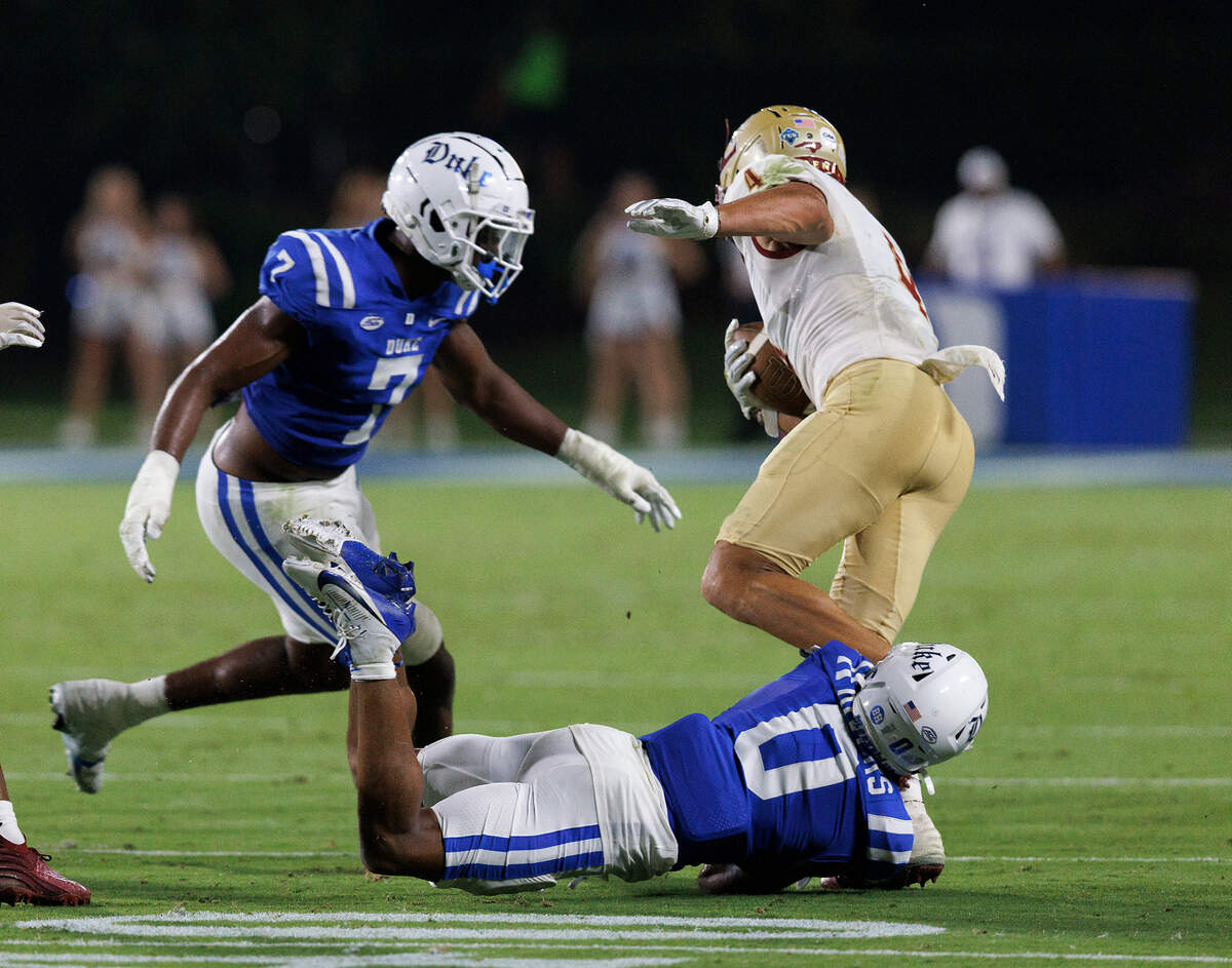 Duke’s Chandler Rivers (0) tackles Elon’s Chandler Brayboy during the first half of the Blue Devils’ 26-3 win on Friday, Aug. 30, 2024, at Wallace Wade Stadium in Durham, N.C.