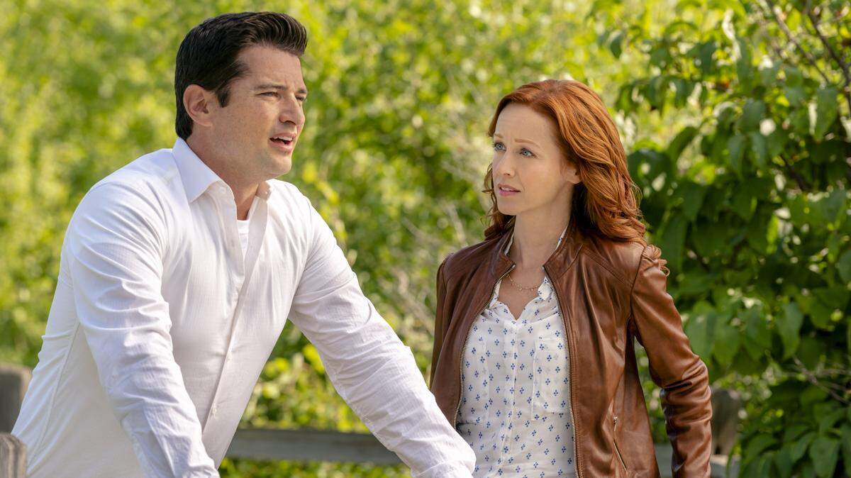 Wes Brown, left, and Lindy Booth in the Hallmark movie “Under the Autumn Moon.”