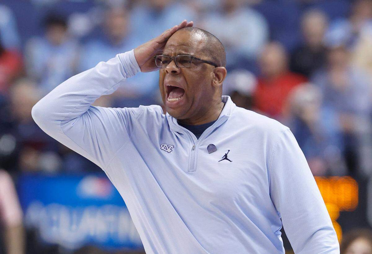 North Carolina head coach Hubert Davis yells to his players during the first half of UNC’s game against Virginia in the quarterfinals of the ACC Men’s Basketball Tournament in Greensboro, N.C., Thursday, March 9, 2023.