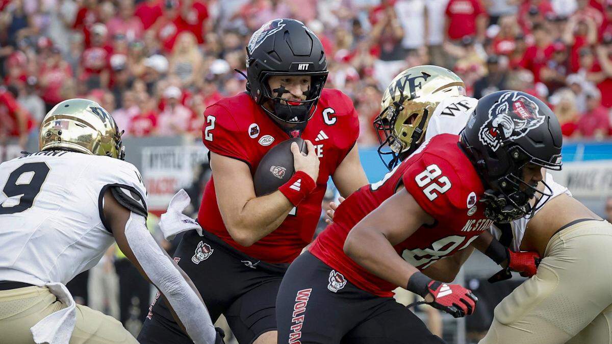 N.C. State quarterback Grayson McCall (2) scrambles for yards before he was hit and injured during the first half of N.C. State’s game against Wake Forest at Carter-Finley Stadium in Raleigh, N.C., Saturday, Oct. 5, 2024.