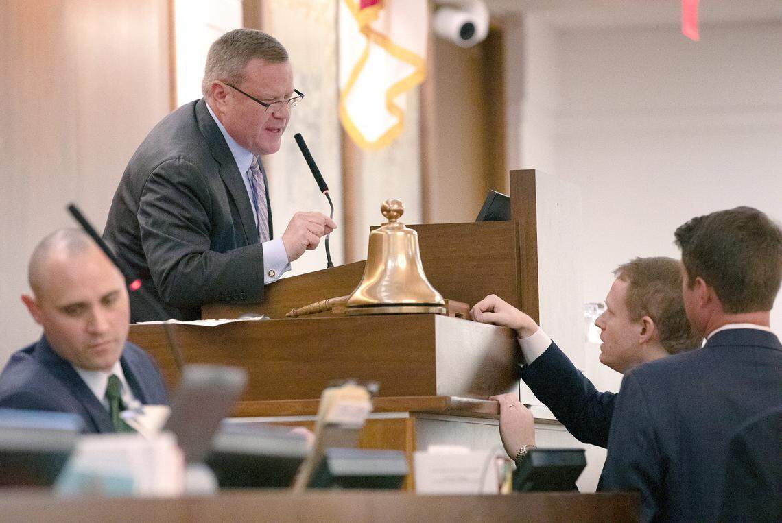 North Carolina House Speaker Tim Moore talks with Rep. Destin Hall during the legislative session on Tuesday, Nov. 19, 2024, in Raleigh, N.C.