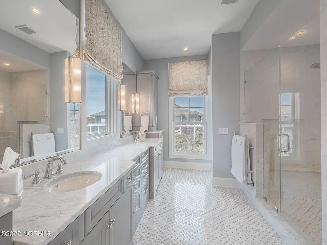 It has six bathrooms and two half-baths.