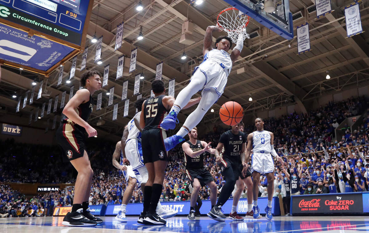 Duke’s Paolo Banchero (5) slams in two during Duke’s 88-70 victory over Florida State at Cameron Indoor Stadium in Durham, N.C., Sat. Feb. 19, 2022.