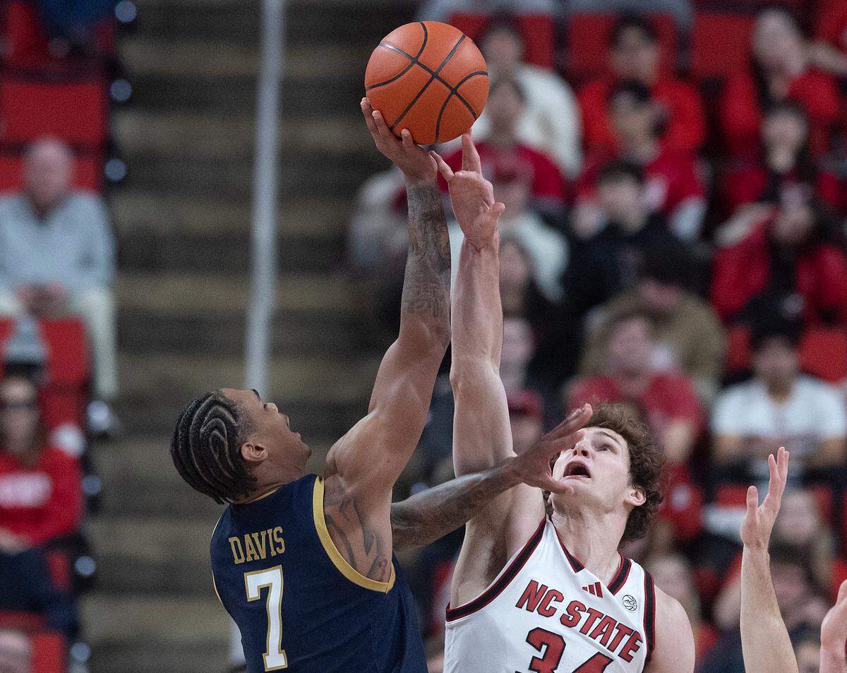 N.C. State’s Ben Middlebrooks blocks a shot by Notre Dame’s Tae Davis during the second half of the Wolfpack’s 66-65 win on Wednesday, Jan. 8, 2025, at Lenovo Center in Raleigh, N.C.