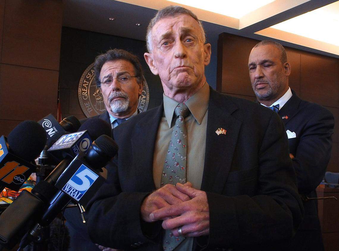 Michael Peterson (center) is flanked by his attorneys David Rudolf (left) and James D. "Butch” Williams (right) at the Durham County Courthouse, in Durham, N.C. Friday, Feb. 24, 2017. He was speaking to the media after taking an Alford plea for manslaughter in the death of his wife Kathleen Peterson on Dec. 9, 2001.  Peterson maintains his innocence even though he plead guilty, which is allowed when taking an Alford plea.