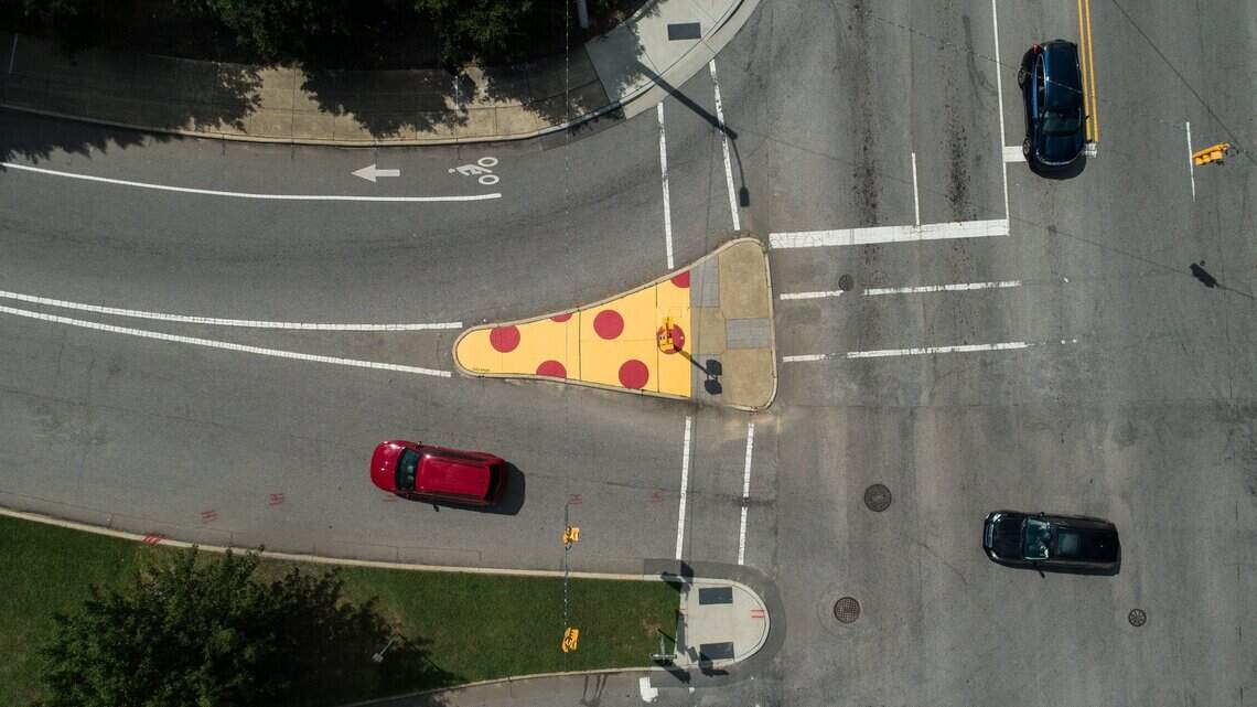 Raleigh sidewalk art project begins with a big slice of pizza