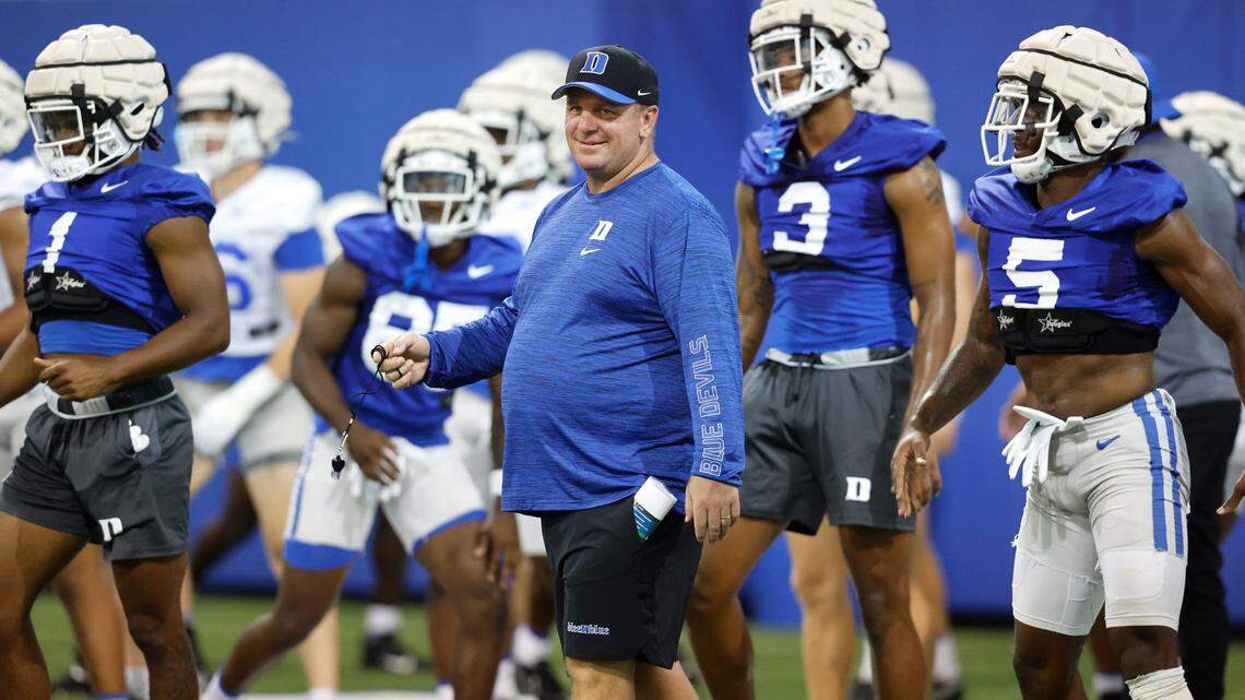 Duke head coach Mike Elko watches during the Blue Devils’ first practice of fall camp in Durham. N.C. Tuesday, August 2, 2022.