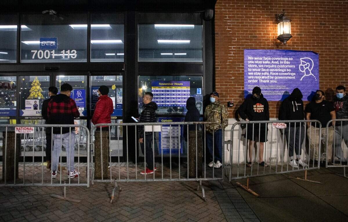 Early morning shoppers wait in line outside of Best Buy in Durham, N.C. on Black Friday, Nov. 26, 2021. While many big-box stores began opening on Thanksgiving Day in years past, almost all major retailers have reversed that decision since the pandemic.
