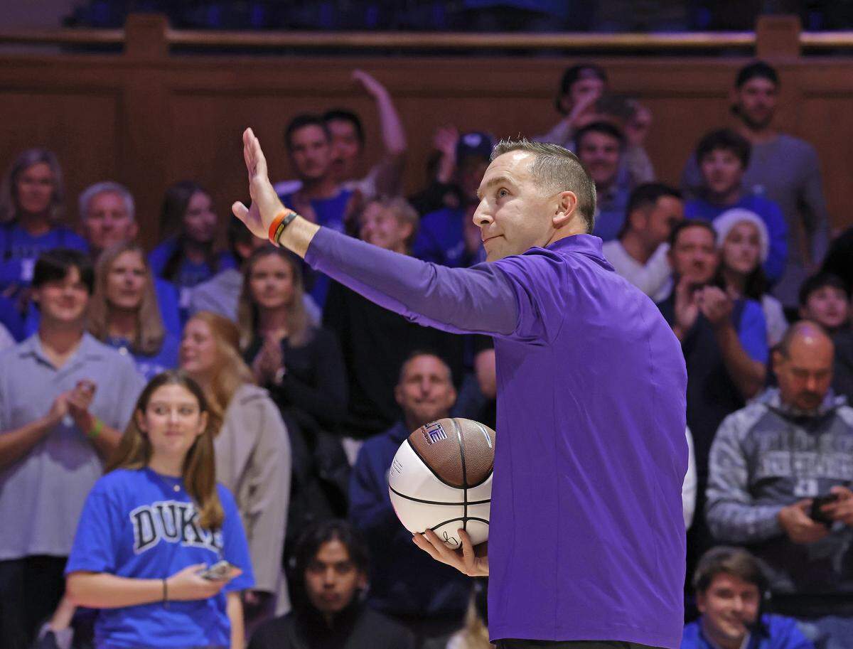 Niagara head coach and former Duke player Greg Paulus acknowledges the crowd prior on Friday, Nov. 21, 2025, at Cameron Indoor Stadium in Durham, N.C.