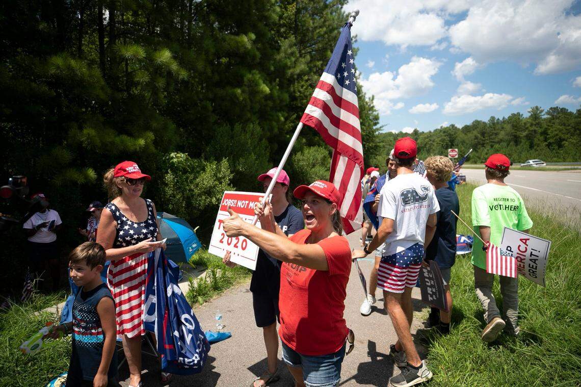 In this July 27, 2020 photo, Michele Morrow of Cary, N.C., center, waits with others for President Donald Trump to show up at Morrisville, N.C. event. Morrow is now the Republican nominee for N.C. superintendent of schools. A recent CNN investigation revealed that in 2020 she expressed support on social media for the televised execution of former President Barack Obama and suggested killing then President-elect Joe Biden.