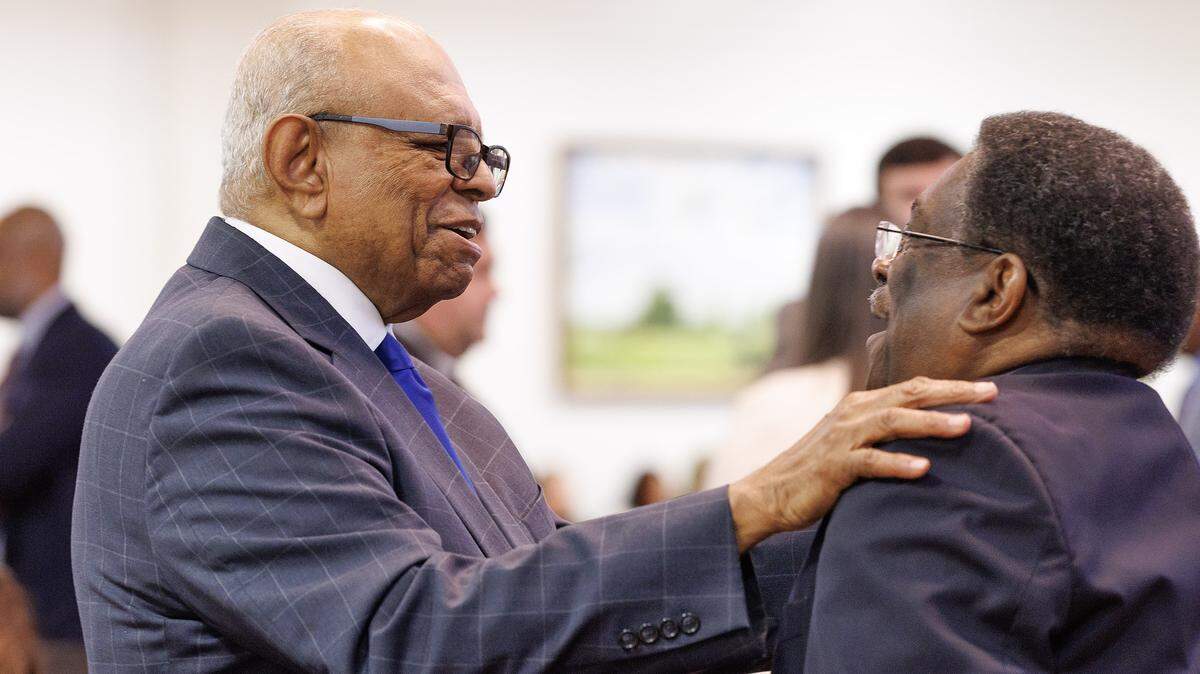 Rep. Nasif Majeed greets Rep. Garland Pierce, a Democrat, prior to the start of the House of Representatives session on Tuesday, April 21, 2026, at the Legislative Building in Raleigh, N.C.