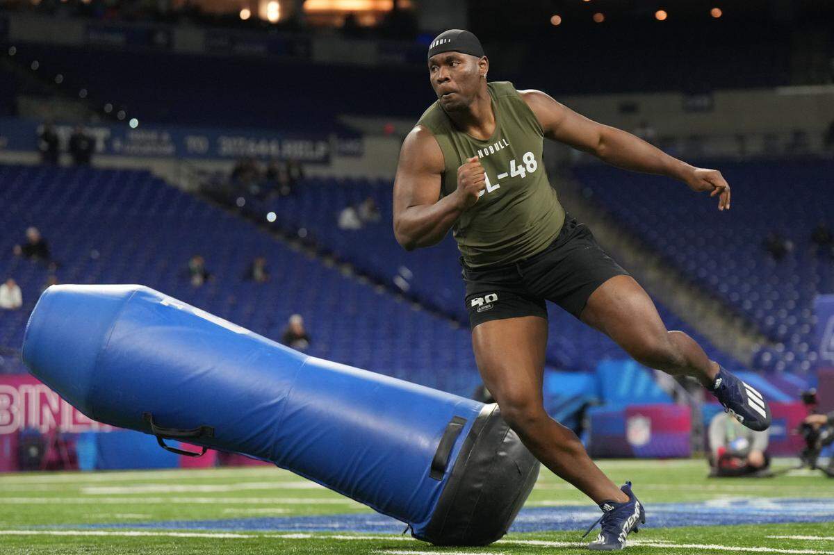 Georgia Tech defensive lineman Keion White participates in drills during the NFL Combine at Lucas Oil Stadium in March 2023.