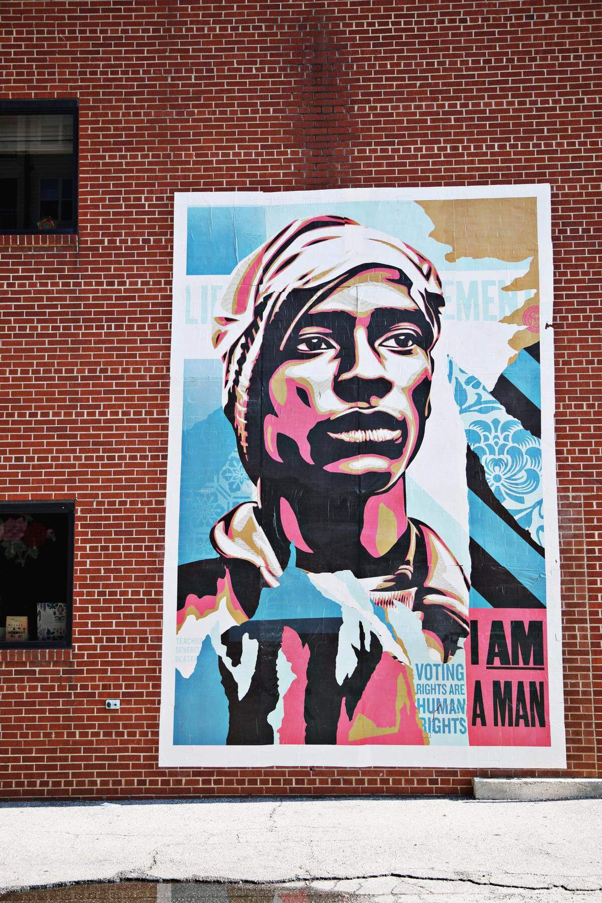 This installation by Shepard Fairey was created as part of the campaign called “Walls for Black Lives” and will hang in eight cities nationwide, including Raleigh where it was hung by locals at The Cortez off of Glenwood Avenue on Monday, July 20, 2020. The piece is a collaboration between public relations agency Big Bowl of Ideas and Branded Arts.