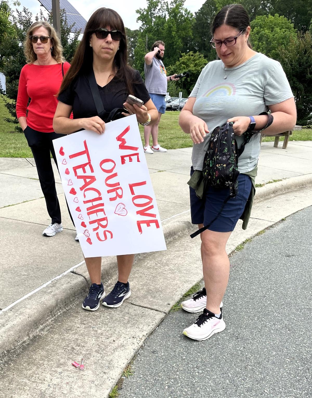 Carrboro High School parents joined their students for a walkout Thursday, May 29, 2025. The demonstrators left school and walked to the district’s administrative building, where they aired their grievances to Superintendent Nyah Hamlett and staff.