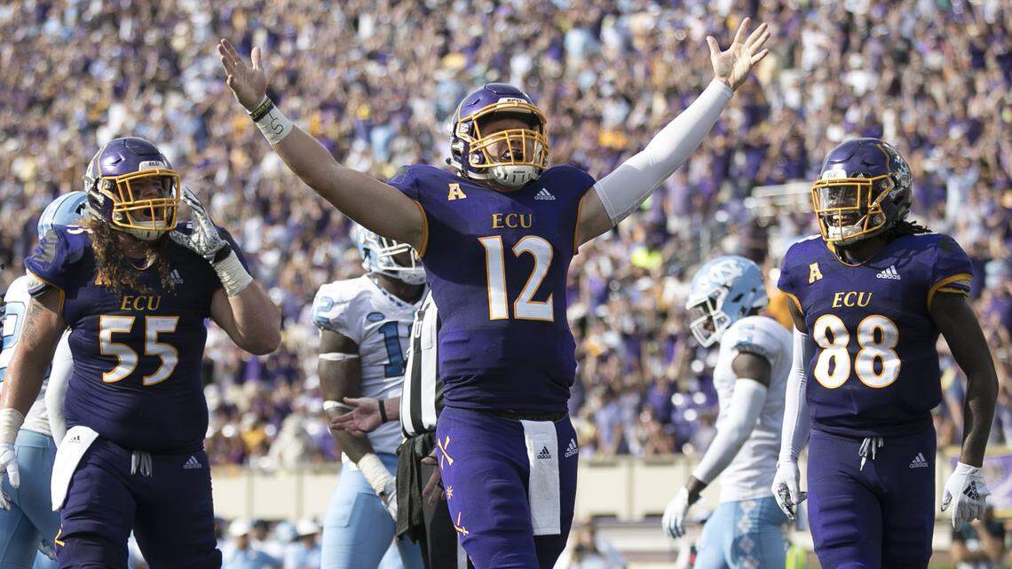 East Carolina quarterback quarterback Holton Ahlers (12) celebrates after scoring a touchdown in the second quarter against North Carolina on Saturday, September 8, 2018 at Dowdy-Ficklen Stadium in Greenville, N.C.