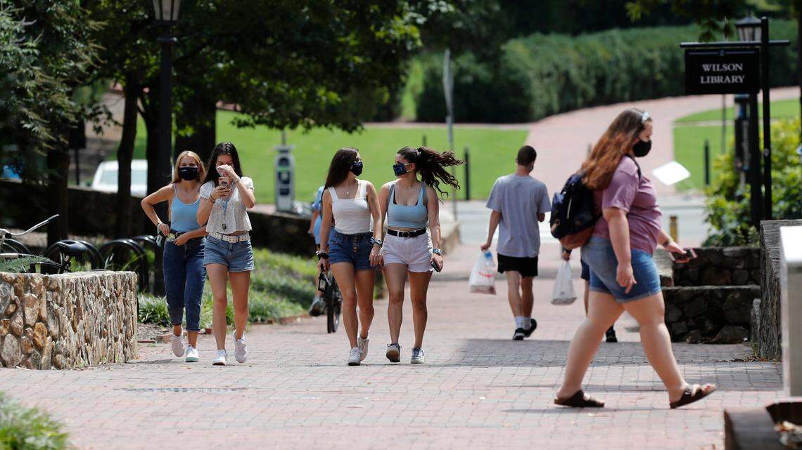 People walk around the UNC campus in Chapel Hill, N.C. Tuesday, August 18, 2020. College enrollment has dropped by over 1 million students since the COVID-19 pandemic began, according to a Jan. 13 report.