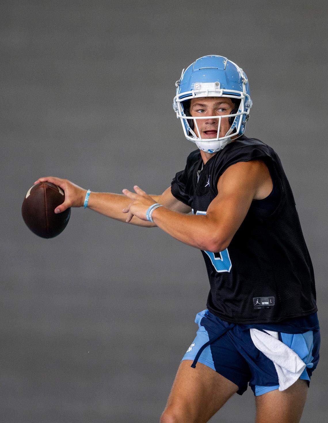 North Carolina quarterback Drake Maye (10) looks for a receiver during the Tar Heels’ first practice of the season on Wednesday, August 2, 2023 in Chapel Hill, N.C.