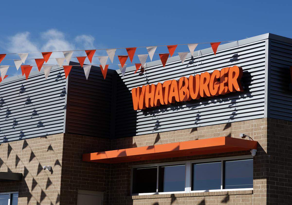 Mebane’s new Whataburger, located at 1004 Mebane Oaks Road, was decked out with orange-and-white flags to celebrate its grand opening.