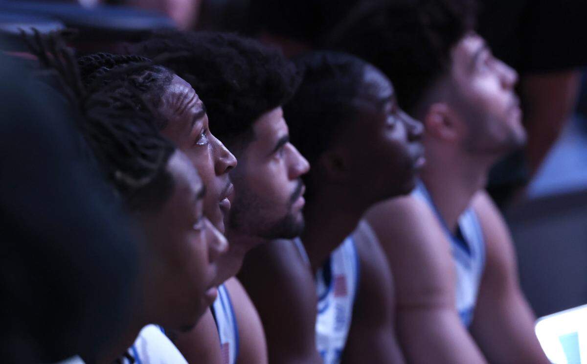 From left, Duke’s Isaiah Evans, Maliq Brown, Cayden Boozer, Dame Sarr  and Cameron Boozer watch the intro video before Duke’s game against St. John’s in the Sweet 16 of the NCAA Men’s Basketball East Regional at Capital One Arena in Washington, D.C., Friday, March 27, 2026.