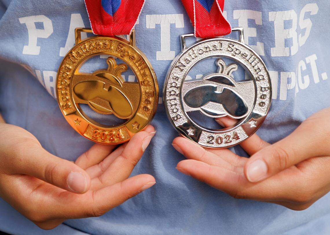 Davis Drive Middle School seventh-grader Ananya Rao Prassanna poses with her Scripps National Spelling Bee medals following a celebration honoring her third-place finish in the competition on Monday, June 3, 2024, in Cary, N.C.