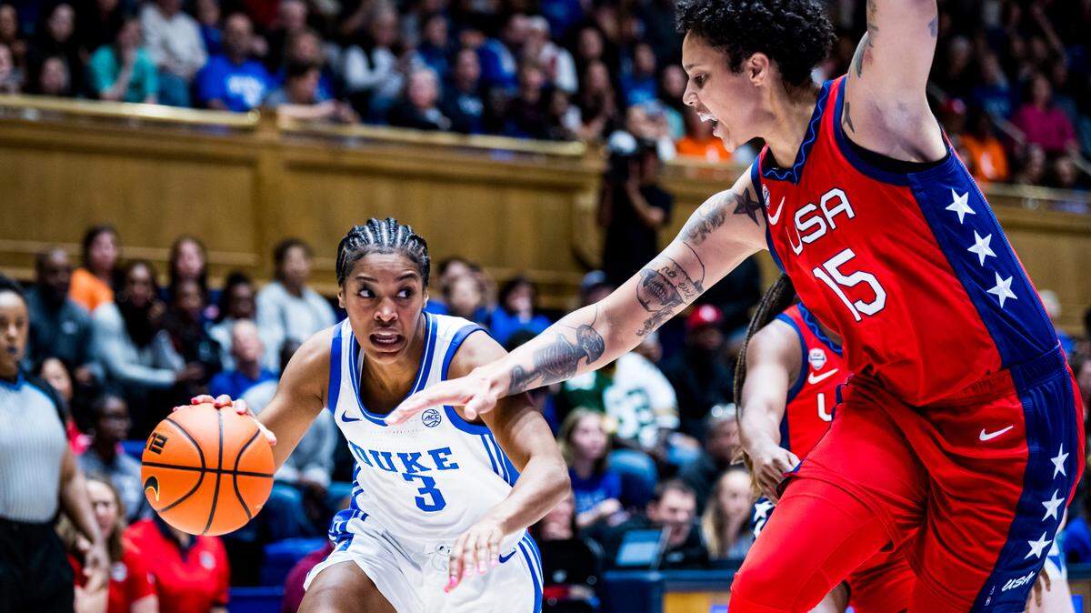 Duke guard Ashlon Jackson, left, drives toward Team USA’s Brittney Griner during the teams’ exhibition game in Durham, NC, on Sunday, Nov. 12, 2023.