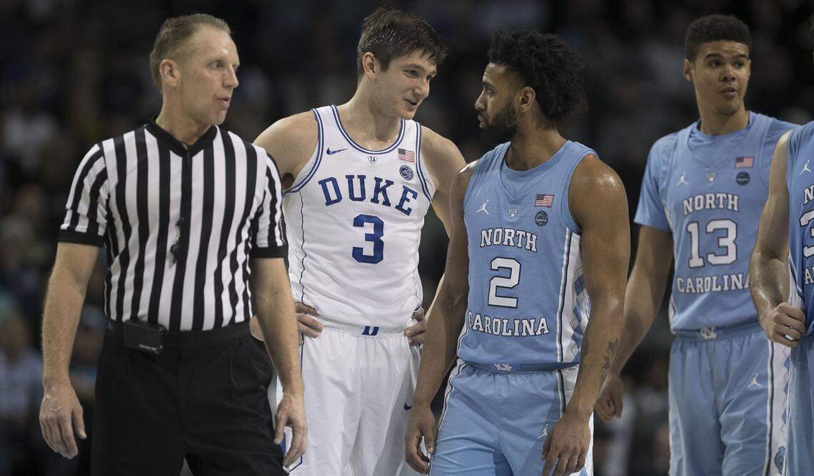 Duke's Grayson Allen (3) talks to North Carolina's Joel Berry II (2) after being called for a flagrant 1 foul in the first half.