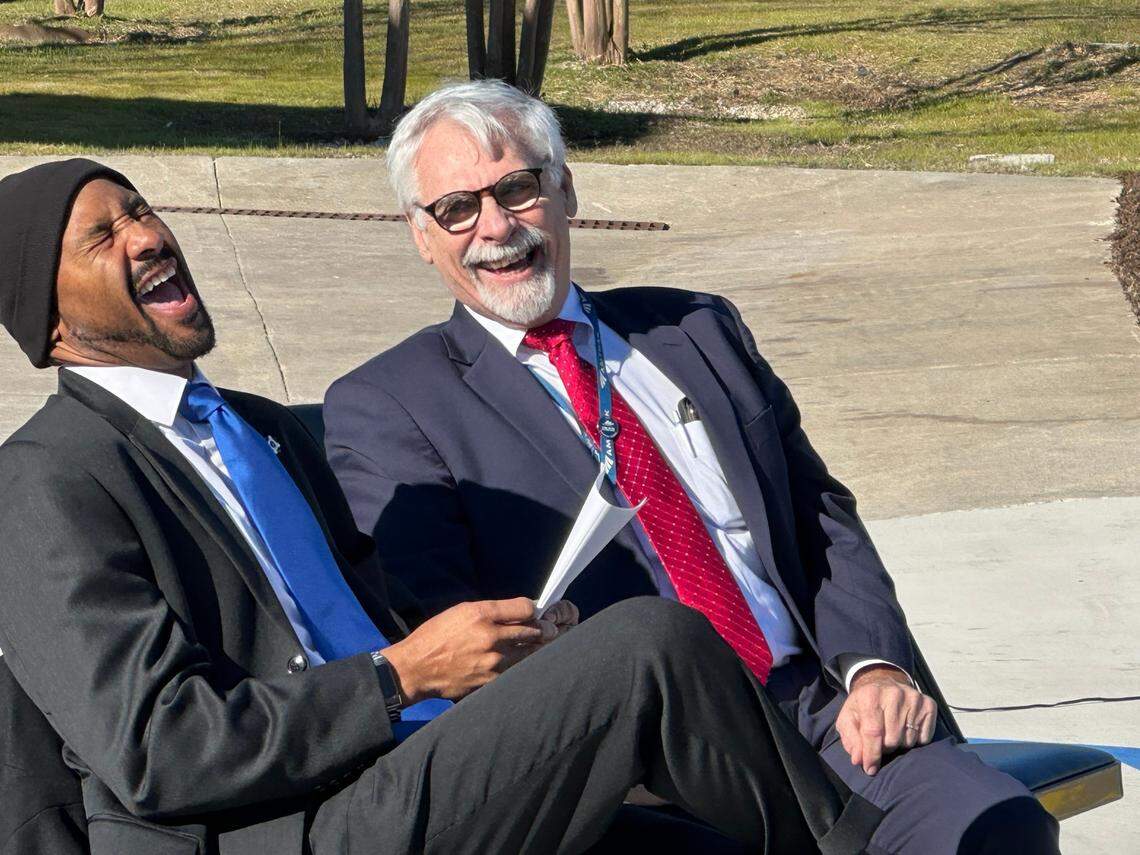 Selma Mayor Byron McAllister, left, shares a laugh with Amtrak vice president David Handera at an event to celebrate a new passenger platform on Feb. 14, 2024.
