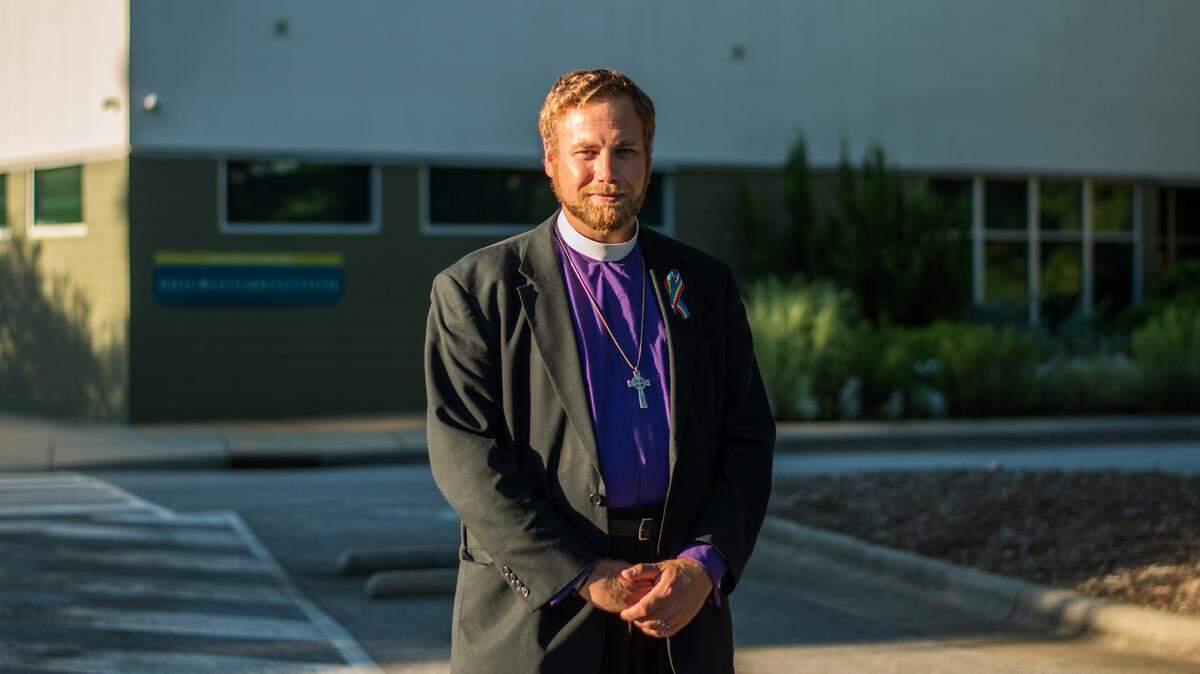 Rev. Vance Haywood of St. John’s Metropolitan Community Church stands for a portrait outside the Green Road Community Center in Raleigh. Haywood was personally invited by the White House to an event at the center where President Joe Biden spoke on Thursday, June 24, 2021.