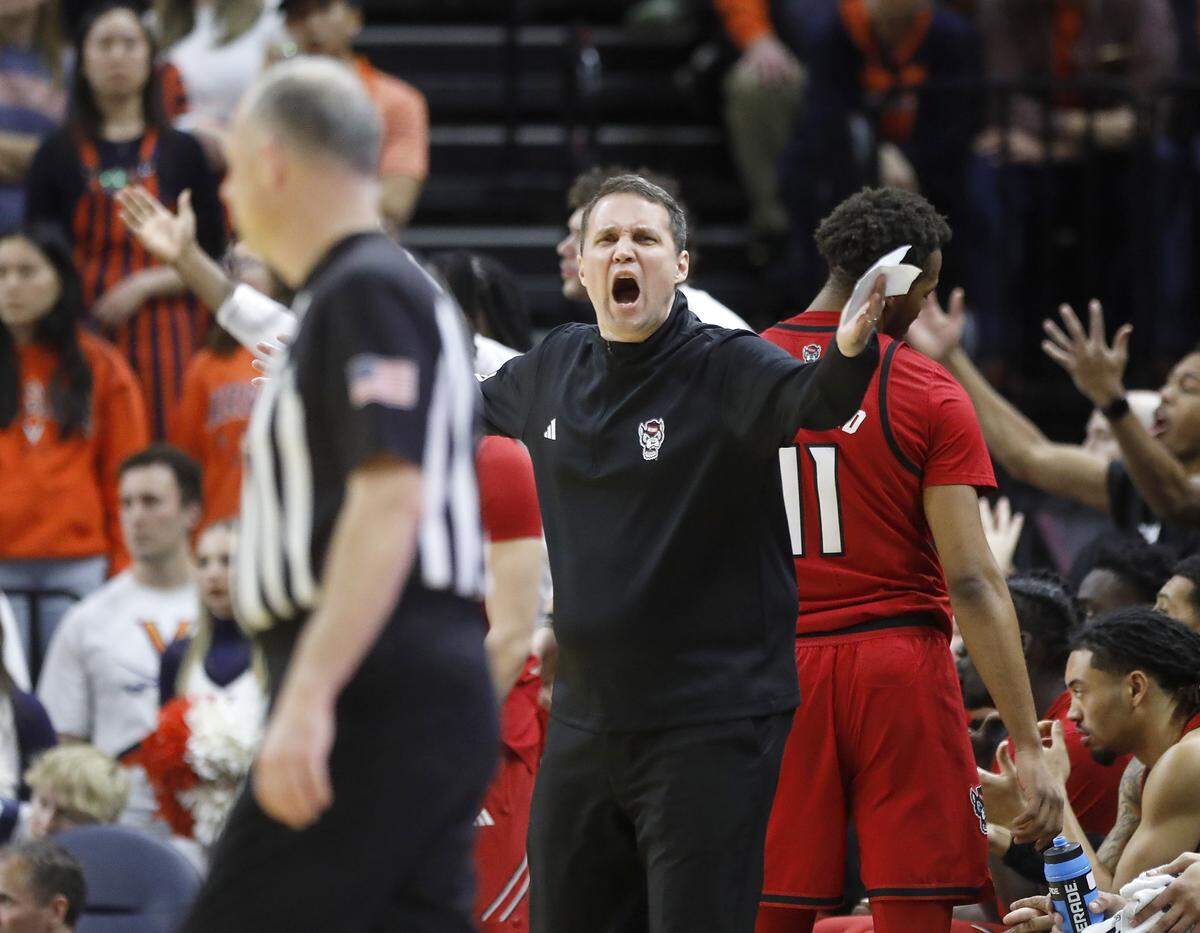 N.C. State head coach Will Wade reacts to a call by an official during the first half of the Wolfpack’s game against Virginia on Thursday, Feb. 24, 2026, at John Paul Jones Arena in Charlottesville, Va. 