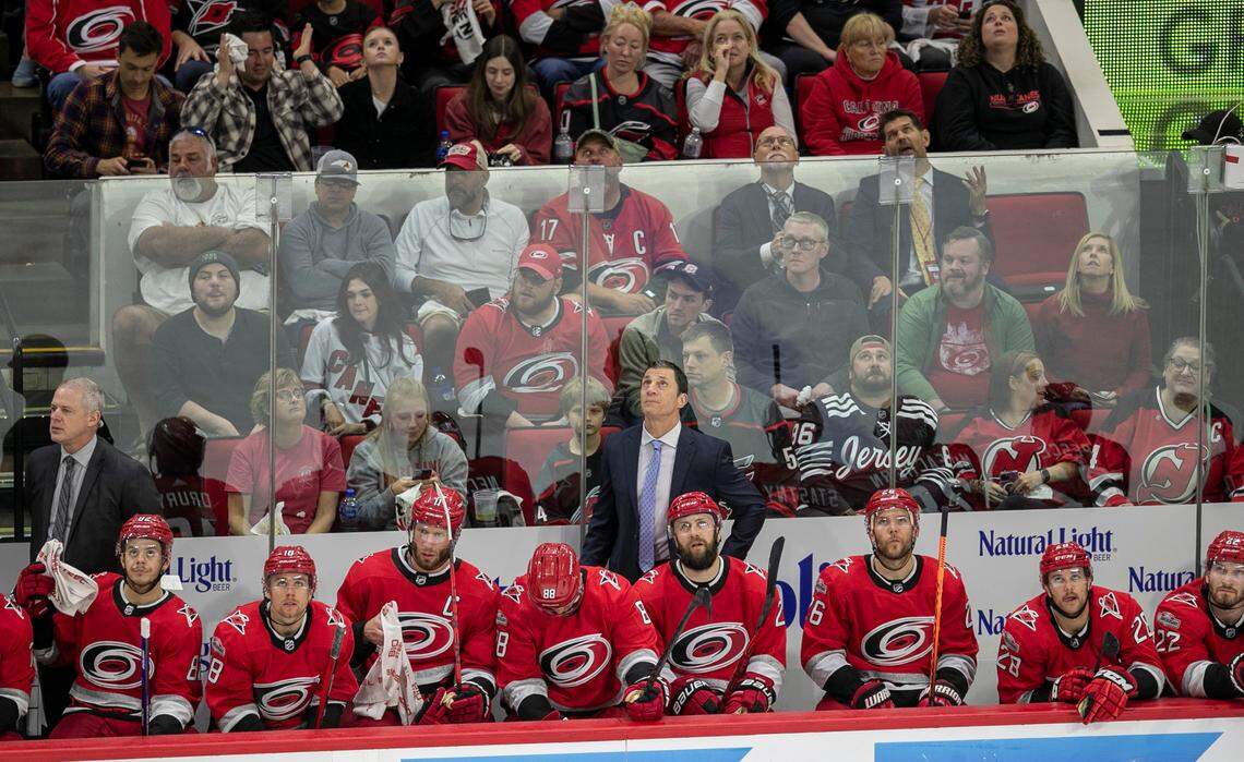 Carolina Hurricanes coach Rod Brind’Amour checks the scoreboard during the third period against the New Jersey Devils during Game 5 of their second round Stanley Cup playoff series on Thursday, May 11, 2023 at PNC Arena in Raleigh, N.C.