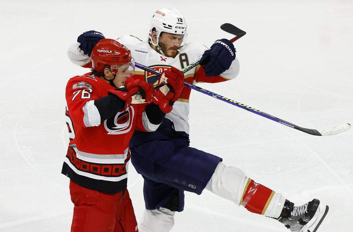 Carolina defenseman Brady Skjei (76) knocks Florida left wing Matthew Tkachuk (19) from the puck during the second period of game two between the Hurricanes and Panthers in the Eastern Conference Finals at PNC Arena in Raleigh, N.C., Saturday, May 20, 2023.