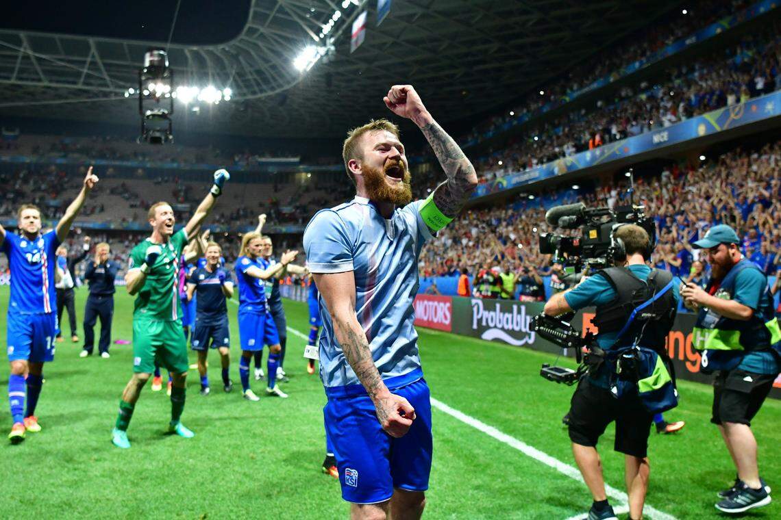 Aron Gunnarsson of Iceland celebrates after a 2016 match against England at Allianz Riviera Stadium in Nice, France. This will be Iceland's first time playing in the World Cup.