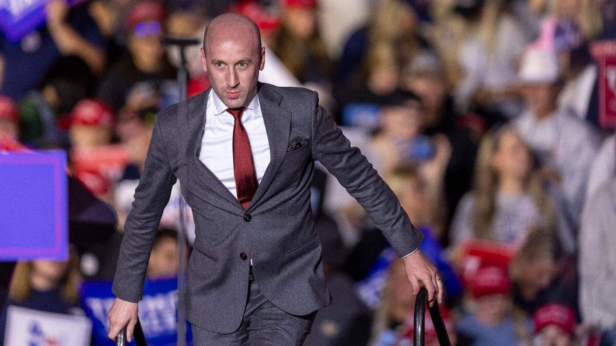 Former Trump senior adviser Stephen Miller takes the stage to speak during a rally for former President Donald Trump at Minges Coliseum in Greenville on Monday, Oct. 21, 2024.