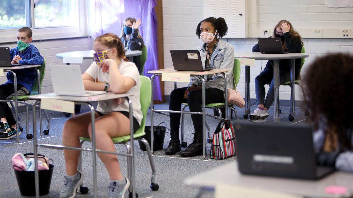 Carroll Middle School sixth-graders attend their ELA class on the first day of in-person school for some students on Monday, Nov. 9, 2020.