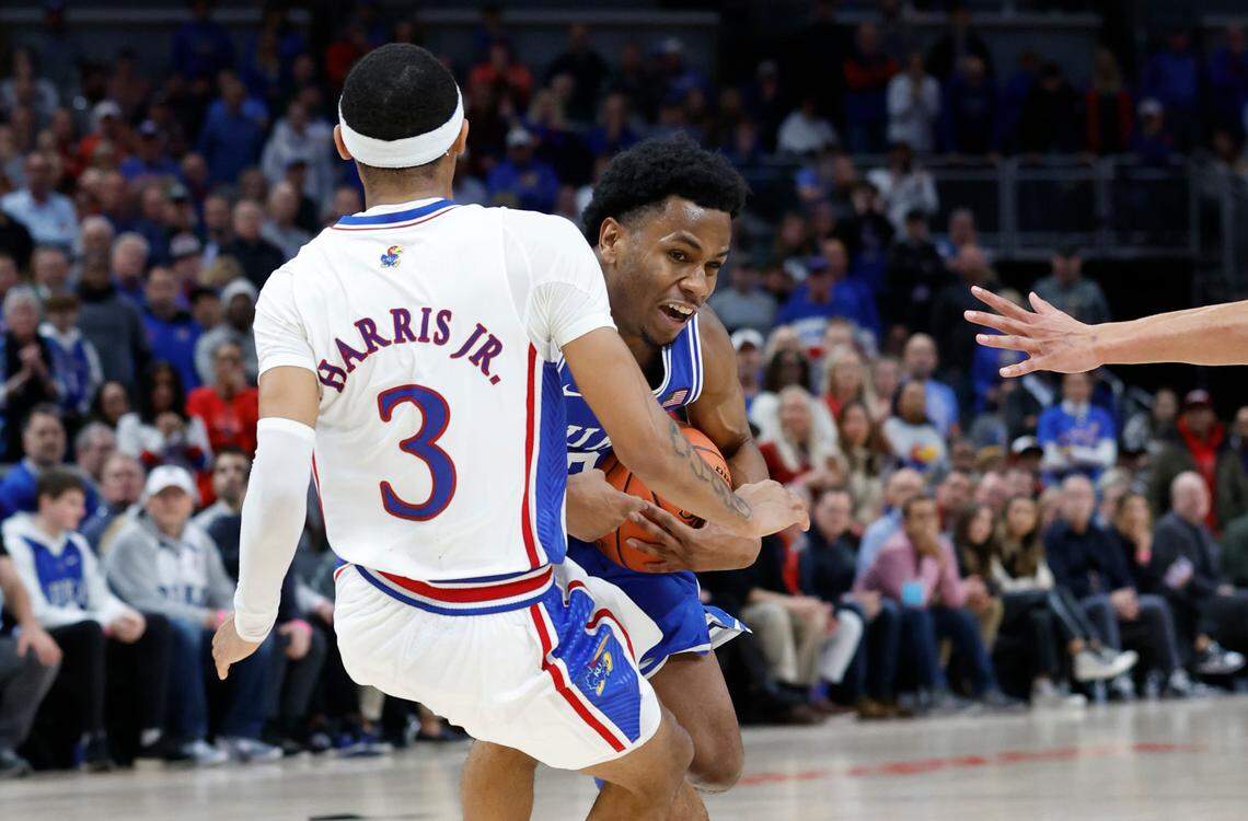 Duke’s Jeremy Roach (3) is called for the charge as Kansas’ Dajuan Harris Jr. (3) defends late in the second half of Kansas’ 69-64 victory over Duke in the State Farm Champions Classic in Indianapolis, Ind. Tuesday, Nov. 15, 2022.