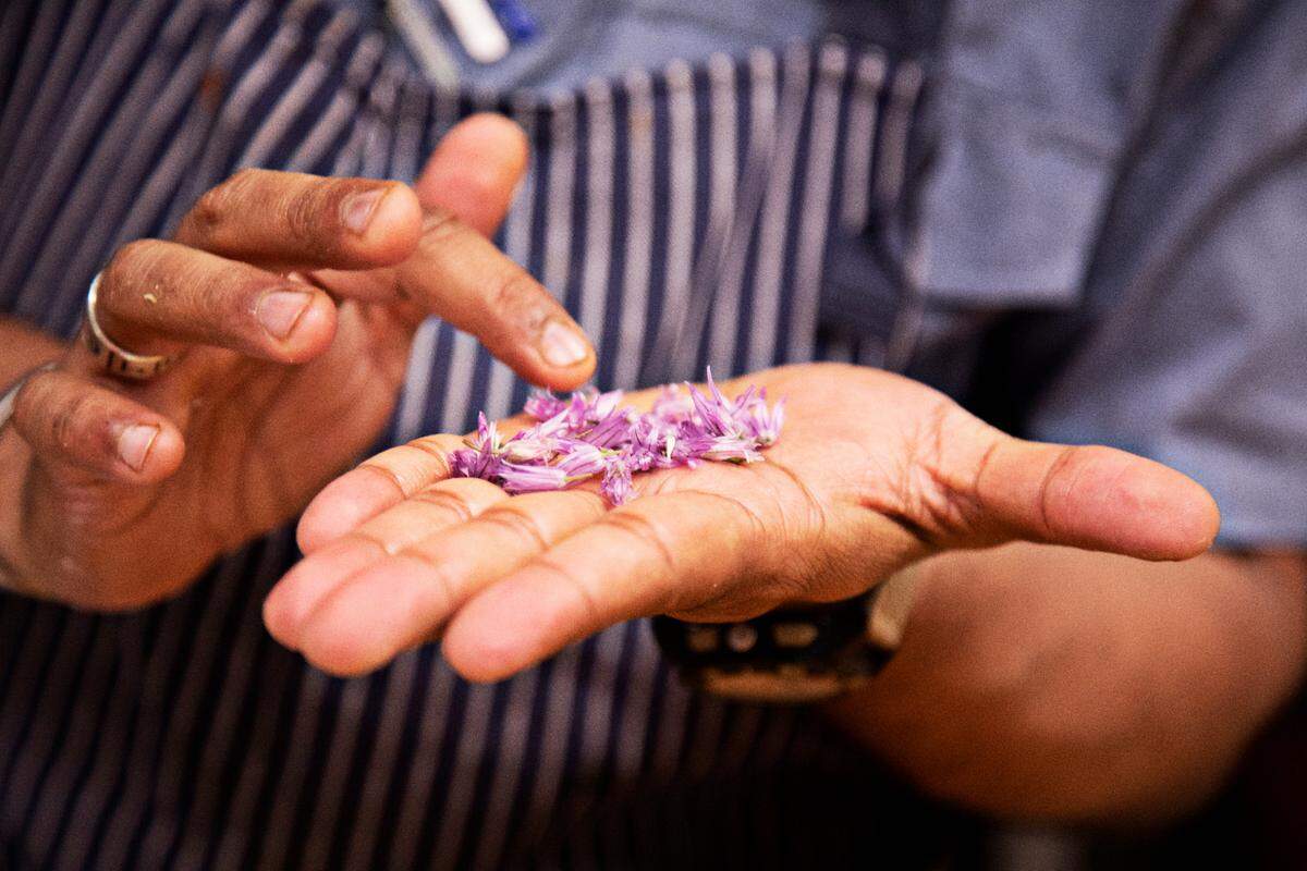 Vidrio chef Saif Rahman prepares a light fruit salad before dinner service on Tuesday, April 26, 2022. Rahman fasts for 14 hours daily during the month of Ramadan and is not able to break his fast until sundown which occurs during dinner service.
