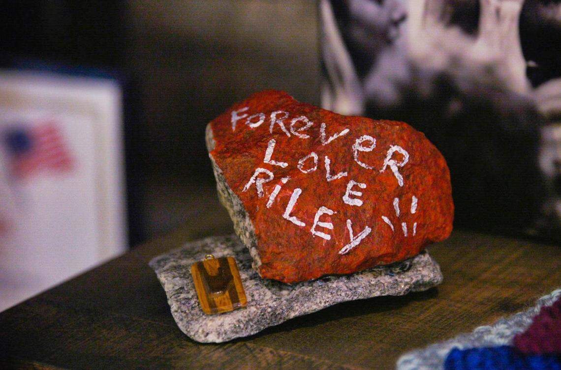 After Riley Howell’s death, his family collected and received many mementos in his honor. Eventually, his parents built shelves to display the things that honored their son’s final act.