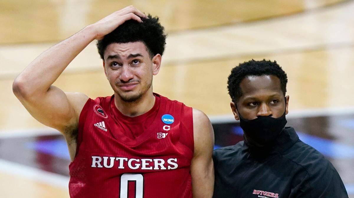 Rutgers’ Geo Baker (0) leaves the court following Rutgers’ loss to Houston in a college basketball game in the second round of the NCAA tournament at Lucas Oil Stadium in Indianapolis Sunday, March 21, 2021. Houston won 63-60. (AP Photo/Mark Humphrey)